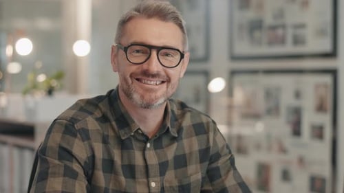 Happy, face and senior businessman in office, management or professional leadership of ceo