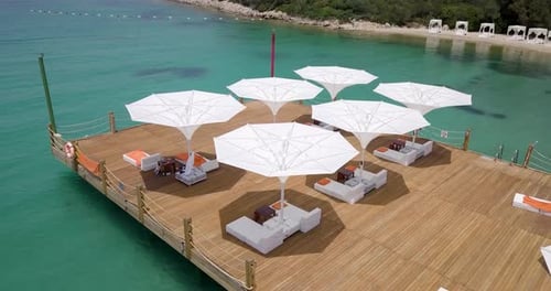 drone view of inverted umbrellas at the resort