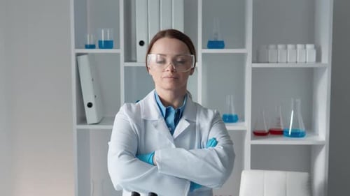Female Scientist in Lab with Arms Crossed Portrait