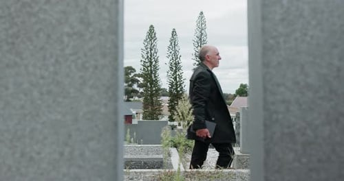 People, walking and funeral in cemetery, outdoor or mourning loss with relatives