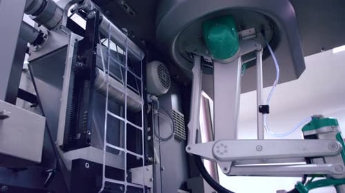 Pharmaceutical Packaging Machine Starting Work. Packaging Line at Pharmaceutical Plant. Modern Equip