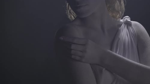 Marble Statue of Themis is Posing in Dramatic Lighting and the Smoke