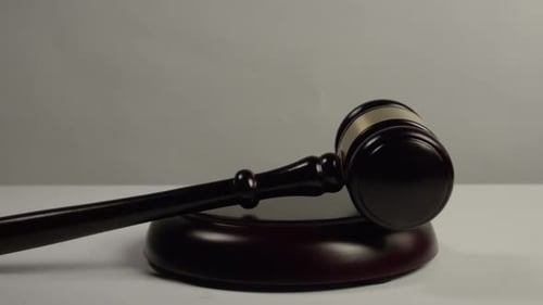 Close Up of Wooden Gavel on Sound Block