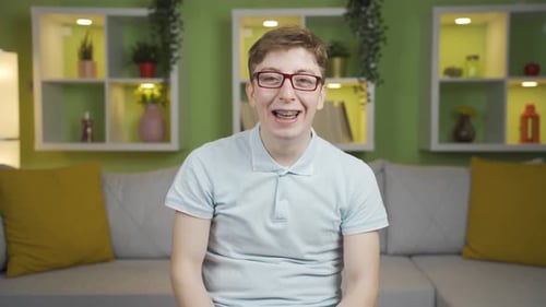 Close-up young man expresses happy and cheerful.