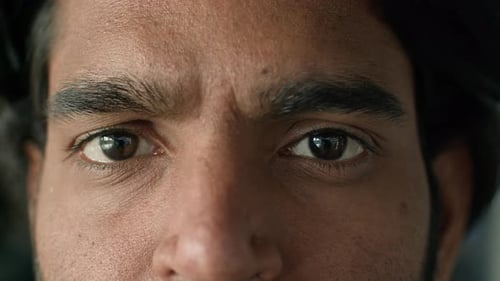 Extreme Macro Closeup View Part Male Face Brown Eyes Serious Unhappy Ethnicity Man Looking at Camera