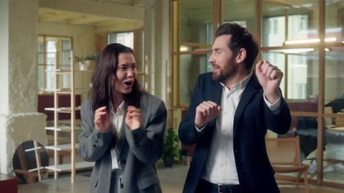 Funny Business Man Woman Dancing Celebrating Music Party at Office Success Deal Caucasian Korean
