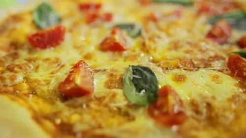 Vegetarian Pizza/Macro of Italian Pizza with Vegetables, Basil, Cheese/Close Up of Vegetarian