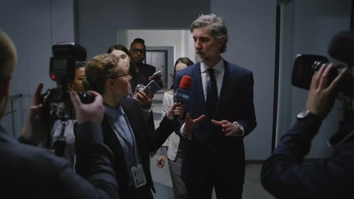 Politician Giving Interview at Press Conference