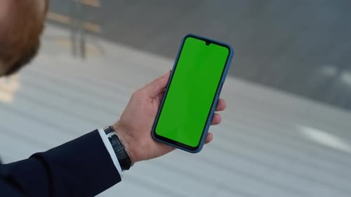 Executive Hands Tapping Chroma Key Mobile Phone Social Media in Office Closeup