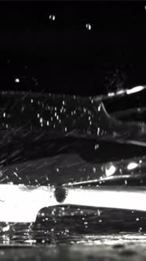The Knife Falls on the Black Table Filmed on a Highspeed Camera at 1000 Fps