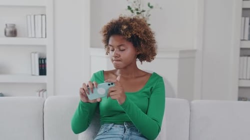 Woman Looking Away After Using Smartphone
