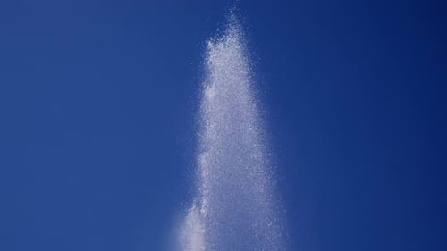 Fountain Jets Rise Sharply Into Clear Blue