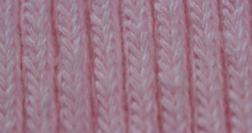 Close Up of Light Pink Knitted Yarn