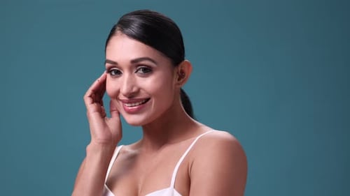 Woman Posing with Hand Touching Face