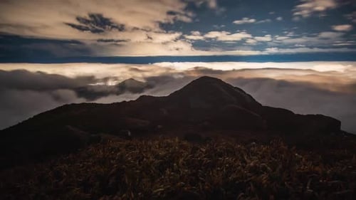 Mountain landscape timelapse moving clouds in Tai Mo Shan, Hong Kong. Cinematic. A sea of fog is for