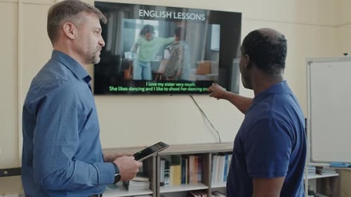 Senior Black Man Learning English Language