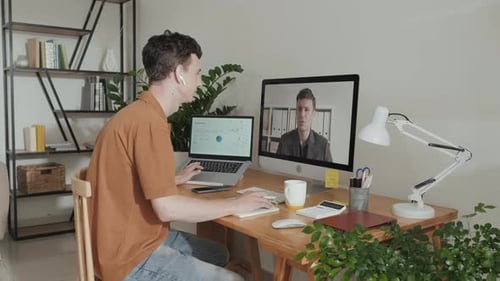 Man Works From Home on Video Conference
