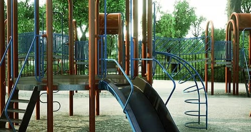 Playground with Climbing Structures and Slides in a Sunny Park Setting