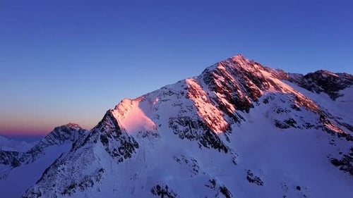 Aerial flight above stunning Alps.