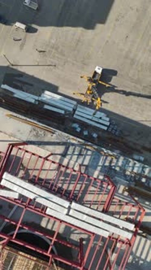 Vertical Video Skyline Progress Aerial View of Roof and Facade Activities