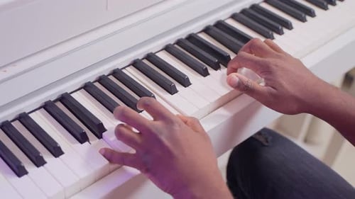 Professional African American Musician Playing on Piano Hands Closeup View