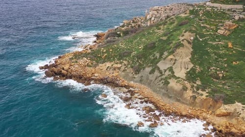 Aerial view of rocky coastline and cliffs, Malta.