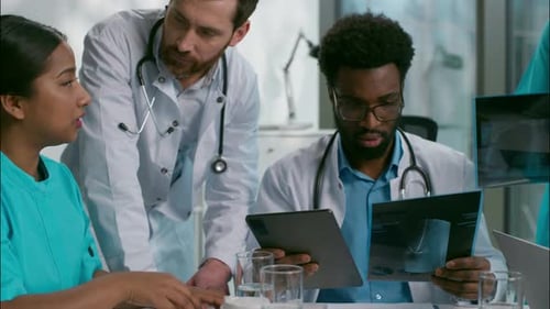 Close Up Professional Multiethnic Diverse Team of Experienced Doctors Men Women Five Medical People