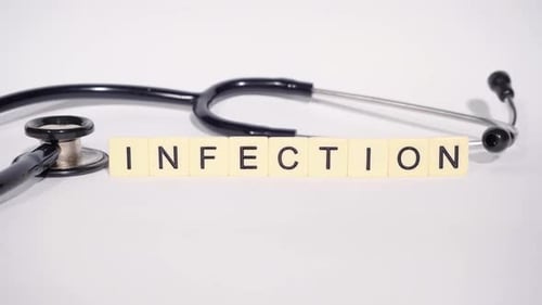 Word Infection with Black Stethoscope on White