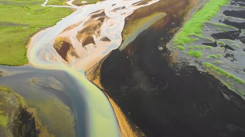 Aerial view of a river along the coast in Iceland.