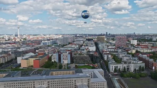 Aerial view revealing The Berlin Weltballon in Berlin city centre on a sunny day