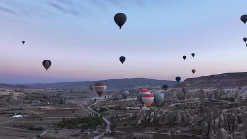 Hot Air Balloons Over Cappadocia Valley at Sunrise