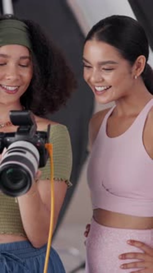 Choice, photographer and women with camera, digital and creative for photos in agency and teamwork