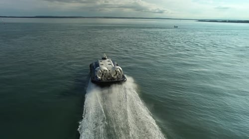 Hovercraft (Air-cushion Vehicle) Speeding From Portsmouth To Isle Of Wight In United Kingdom. aerial