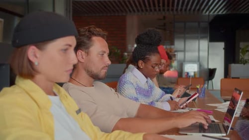 Diverse Group of Professionals Collaborates on Project