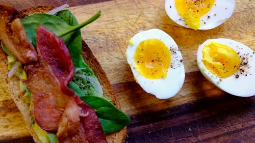 Bacon, Avocado, and Spinach Toast with Eggs