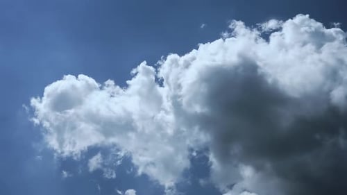 White Clouds Floating in a Blue Sky