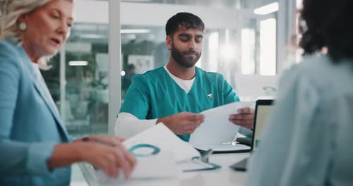 Data, documents and healthcare with people in boardroom of hospital for meeting