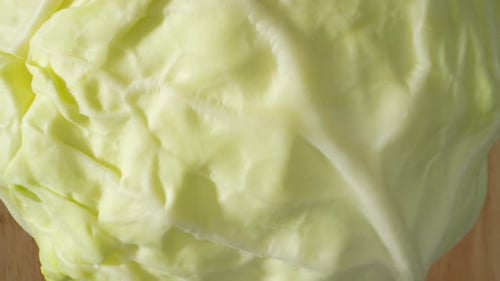 The intricate details of a green cabbage. Macro video