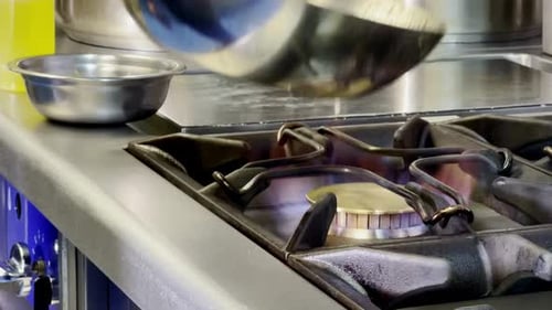 Sauté the vegetables in a kitchen restaurant