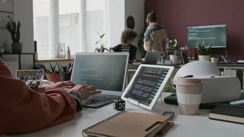 Timelapse of Female Programmer Writing Code at IT Startup