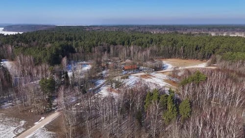 Small village in forest on winter season, aerial view