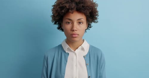 Attractive young woman with afro textured hair