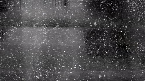 Snow Falling Heavily on the Road