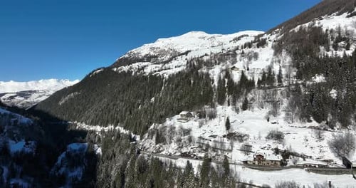 Snowy Mountains Aerial View on a Bright Day