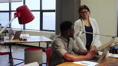 Business People Talking in Open Plan Office 3034 Years