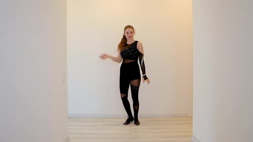 Young Woman Performing Modern Dance Indoors