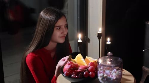 Teen Girl Smiling with Fruit and Marshmallow Treat