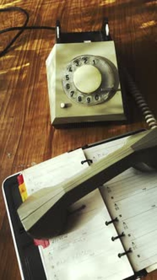 Callers Hands remove and replace hand set onto rotary dial telephone