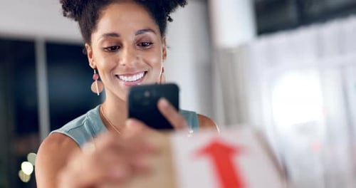 Woman, phone and box in office, scan and checking ecommerce for online shopping orders at night