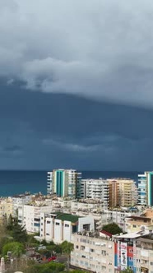 Vertical Video Aerial Warning Stormy Mediterranean Coastline and Cityscape Alarms